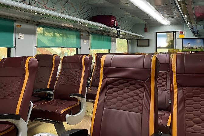 Modern air-conditioned executive coach interior of Gatimaan Express train traveling to Agra Cantt
